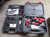 a black case with tools inside of it on the floor