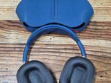 a pair of headphones sitting on top of a wooden floor
