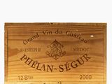 a wooden box with a sign on it that says grand vin de chateau