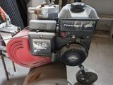 a small engine that is sitting in a garage