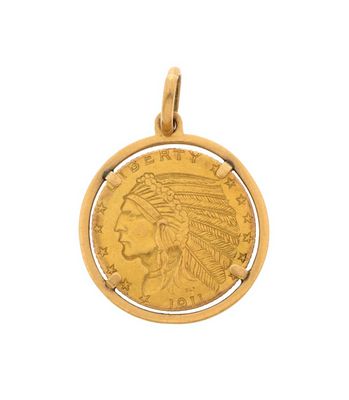 a gold coin with an indian head on it