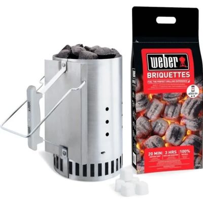 a bag of charcoal sitting next to a stove