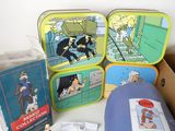 a box of tins that are sitting on a table