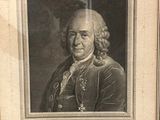 an old picture of a man with long hair in a black and white picture