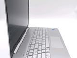 a laptop computer sitting on top of a white table