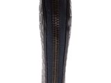 the inside of a black purse with a zipper on it
