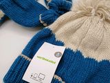 a blue and white knitted hat and a blue and white knitted beanie