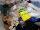 a pile of items in a trash can that is full of stuff