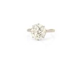 a diamond single - stone ring set in white gold