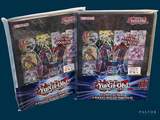 they are two packs of yu gi oh booster cards on a blue background