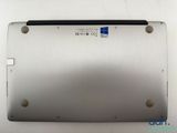 an image of a close up of a metal surface with a laptop on it