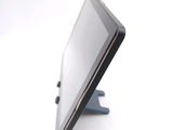 a tablet that is sitting on a stand on the table