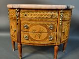 an image of a small chest of drawers with a marble top