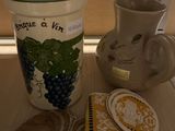 two vases and a coaster on a table