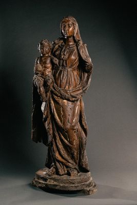 statue of a woman holding a child in her arms