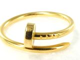 une image représentant une bague en or surmontée d'une barre