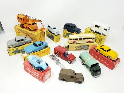 a lot of toy cars that are sitting on a table