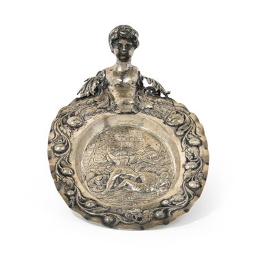 an antique silver plate with a woman holding a fish on it