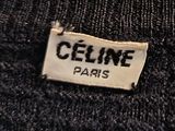 the label of a black sweater with the name celine paris on it