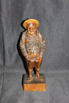 Statue/sculpture en bois "L'homme repu"