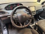 a steering wheel and dashboard of a car in a car showroom