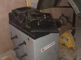 a machine that is sitting on a pallet in a garage