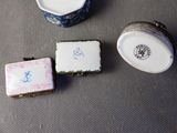 a small box and a small container on a table