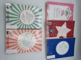 three books on the wall with a star on them