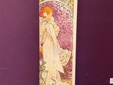 an image of a picture of a woman in a white dress standing in front of a purple wall