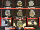 a lot of watches on display on a black table