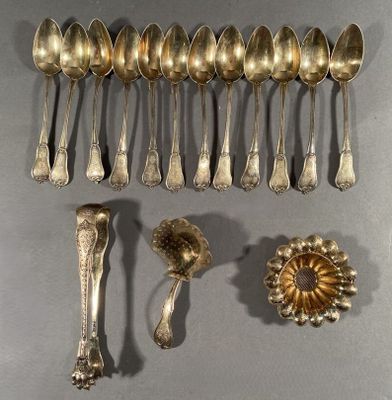 a lot of silver spoons and spoon spoons on a table