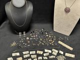 an assortment of jewelry including a necklace, bracelet, and a necklace