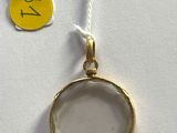 a yellow tag with a smiley face on it hanging from a string