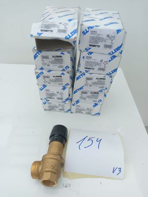 a close up of a couple of boxes of water valves on a table