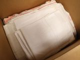 a cardboard box with a lot of papers inside of it