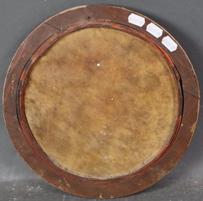a brown plate with a brown rim on a gray surface