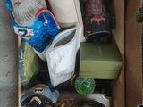 a box full of assorted items sitting on the floor