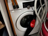 a washer and a dryer in a small room