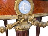 a table with a clock on top of it