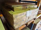 a stack of boxes sitting on a pallet in a warehouse