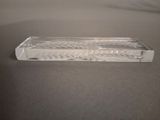 a glass tray with a design on it on a table