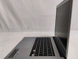 an open laptop computer sitting on top of a white table