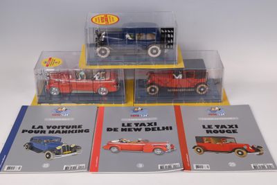 four different models of cars on display in a display case