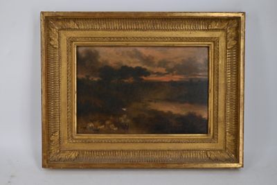 une peinture à l'huile représentant un paysage avec des nuages, dans un cadre doré