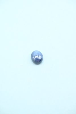an image of a blue pearl on a white surface