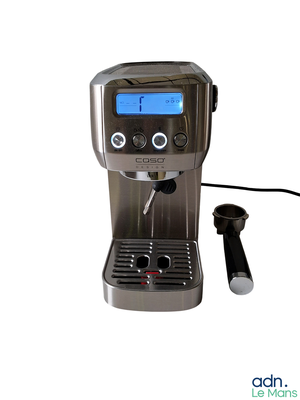 a coffee machine that is connected to a coffee cup