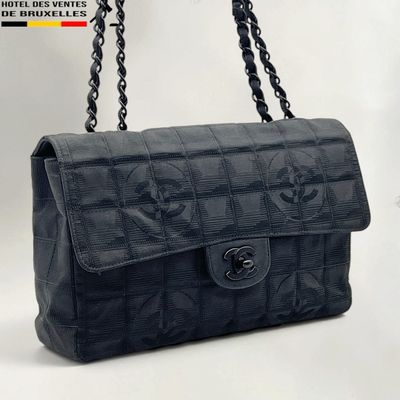 chanel black quilted leather handbag with skull and crossbones