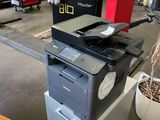 a printer that is sitting on top of a box