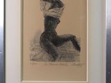 tableau représentant une femme coiffée d'un chapeau, dans un cadre