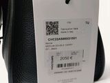 a black bag with a price tag attached to it